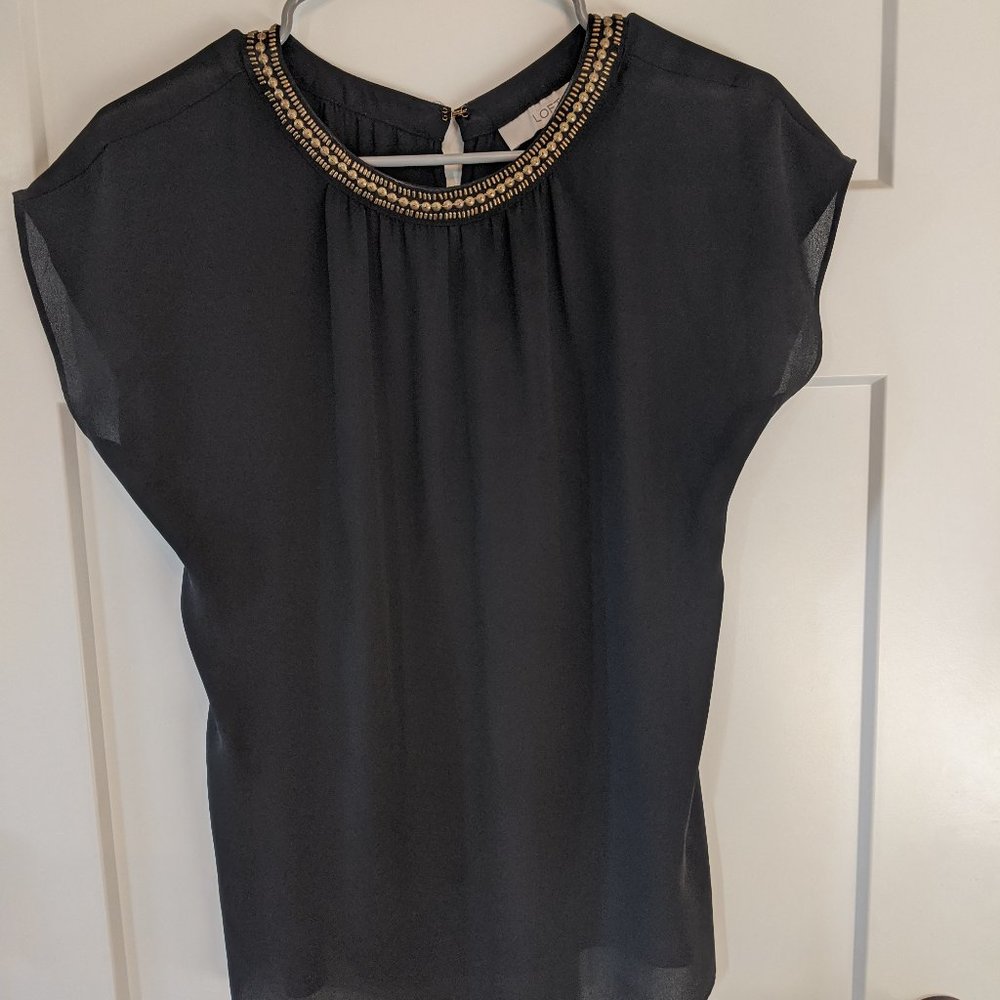 Black top with gold beading